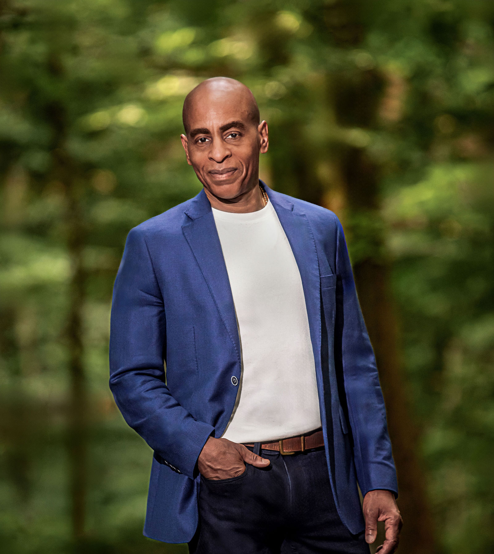 Terry Henry, founder of Dialed In Dating, in a blue blazer outdoors